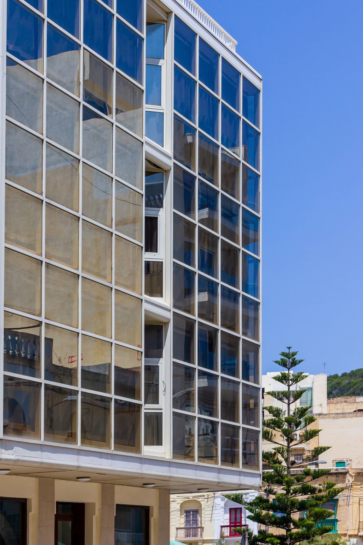 Facility operations manager overseeing building maintenance in Malta, eco-friendly facility supplies.